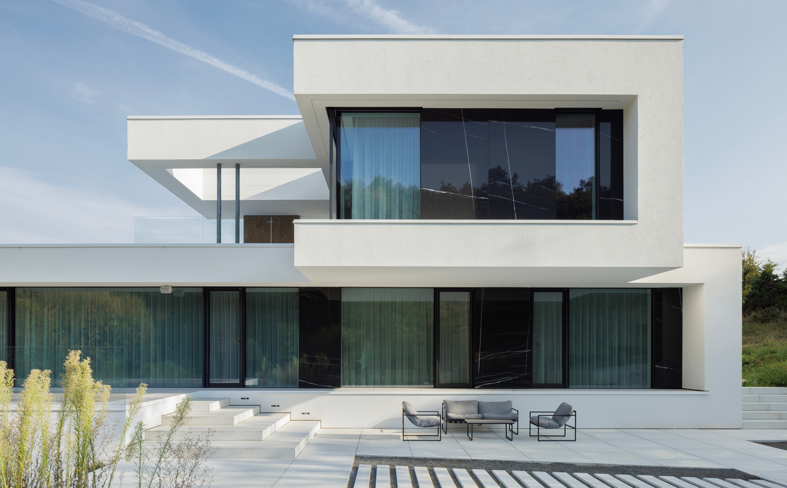 Luxusní bezrámová okna v kombinaci s hliníkovými prvky Schüco